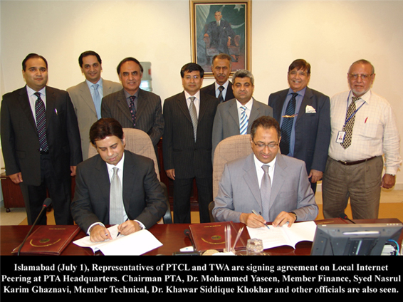 representative of ptcl and twa are signing agreement 